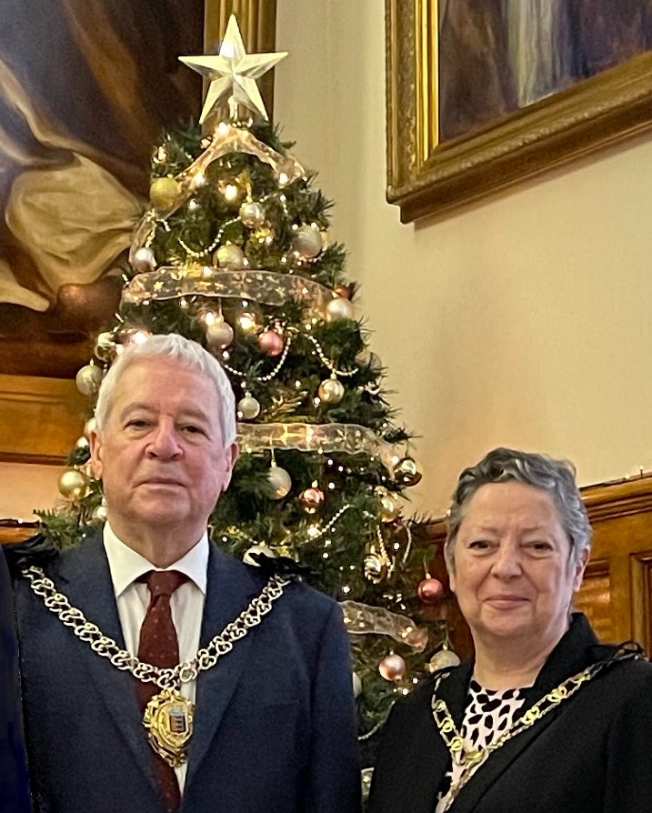 Mayor and Mayoress in front of Christmas Tree