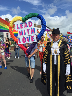 Deal mayor and mayoress marching at Deal Pride
