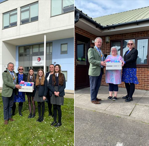 The Mayor and Town Clerk delivering period products
