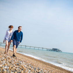 Walkers on Deal beach